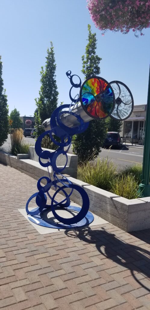 An image of a large metal and glass kaleidoscope sculpture that was previously funded by the Janice Seagraves Foundation
