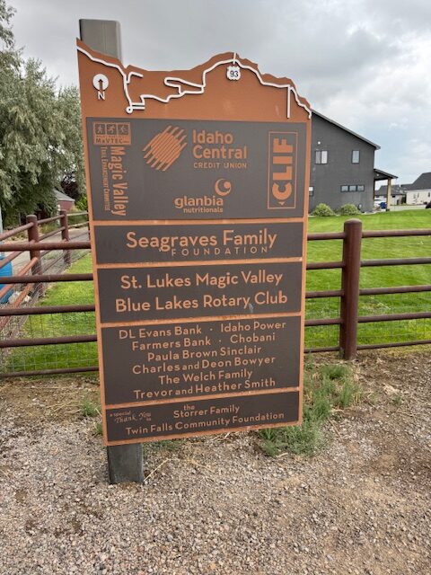A large sign showing contributors to a hiking trail that was added to Twin Falls, ID